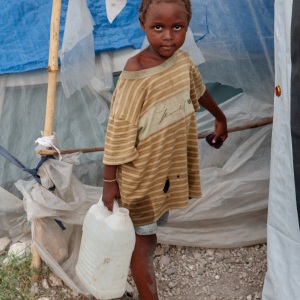 Water duty, Palais de l'Art IDP camp